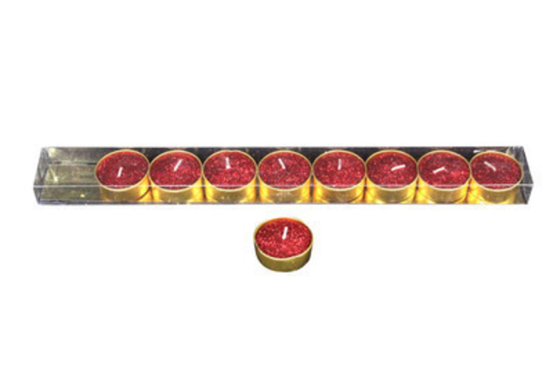 Light up your home with this set of 9 wax tea light candles in Glittery Red by designer Gisela Graham.